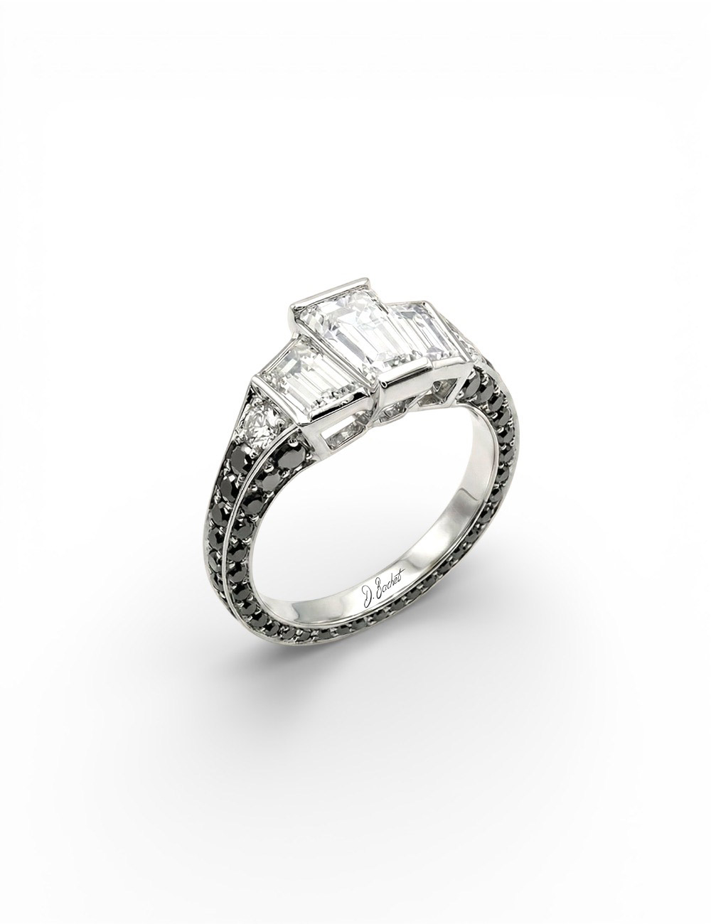 D.Bachet L’Origine ring in platinum set with three natural step-cut white diamonds and black diamonds.