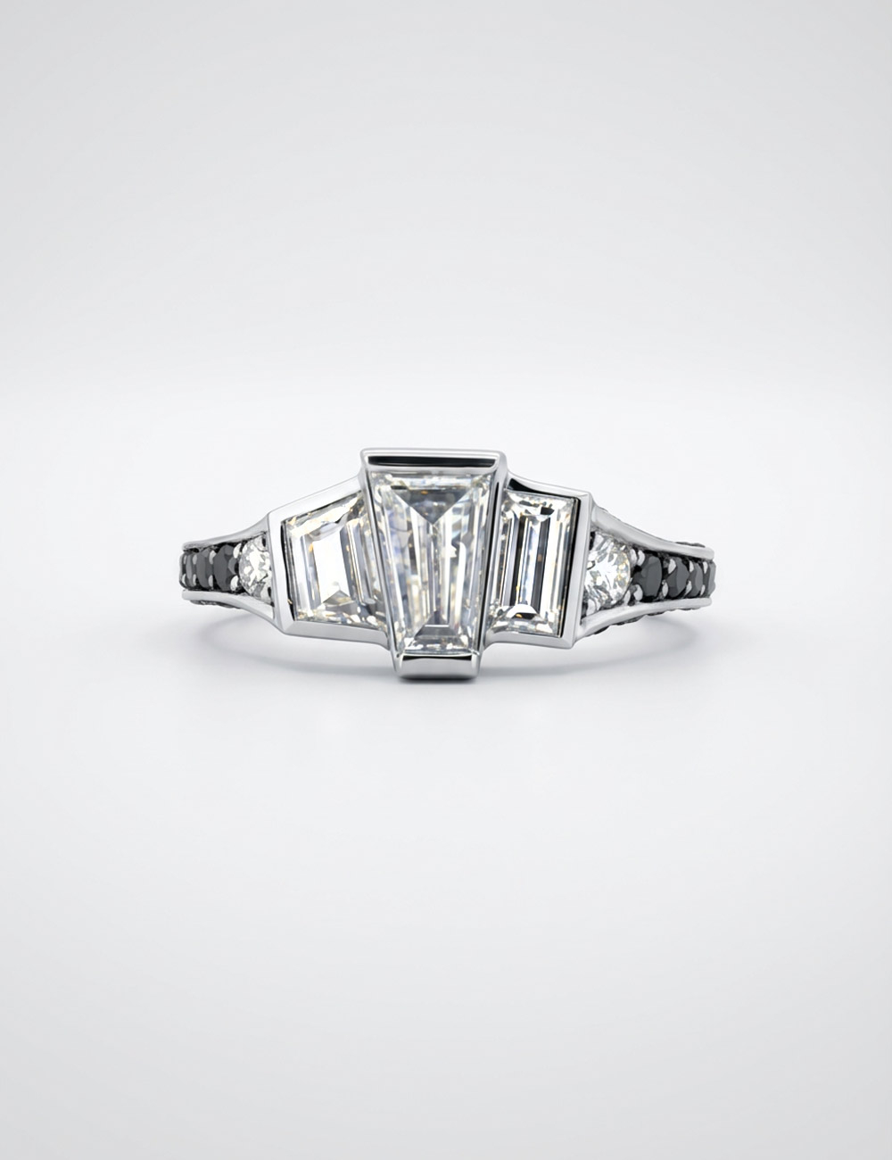 Close-up of the three natural step-cut white diamonds at the centre of the D.Bachet L’Origine platinum ring.