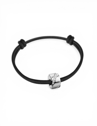 Women's black cord bracelet in white gold with a channel-set diagonal ribbon of white diamonds Wrapped in Love.