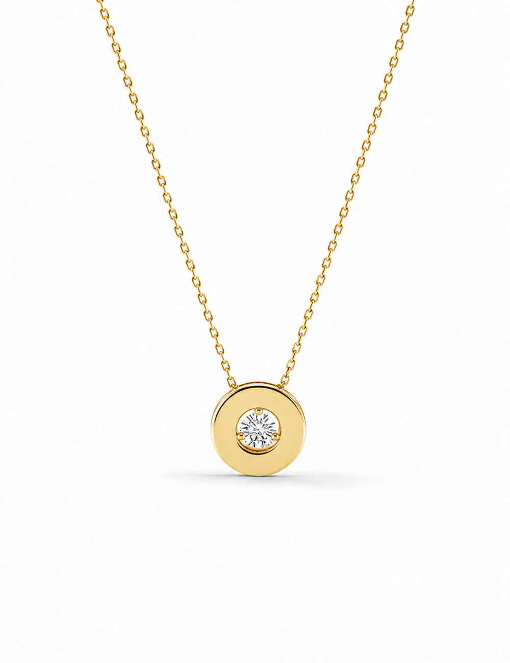 Aura necklace for women in yellow gold with a sleek round pendant and a central white diamond.