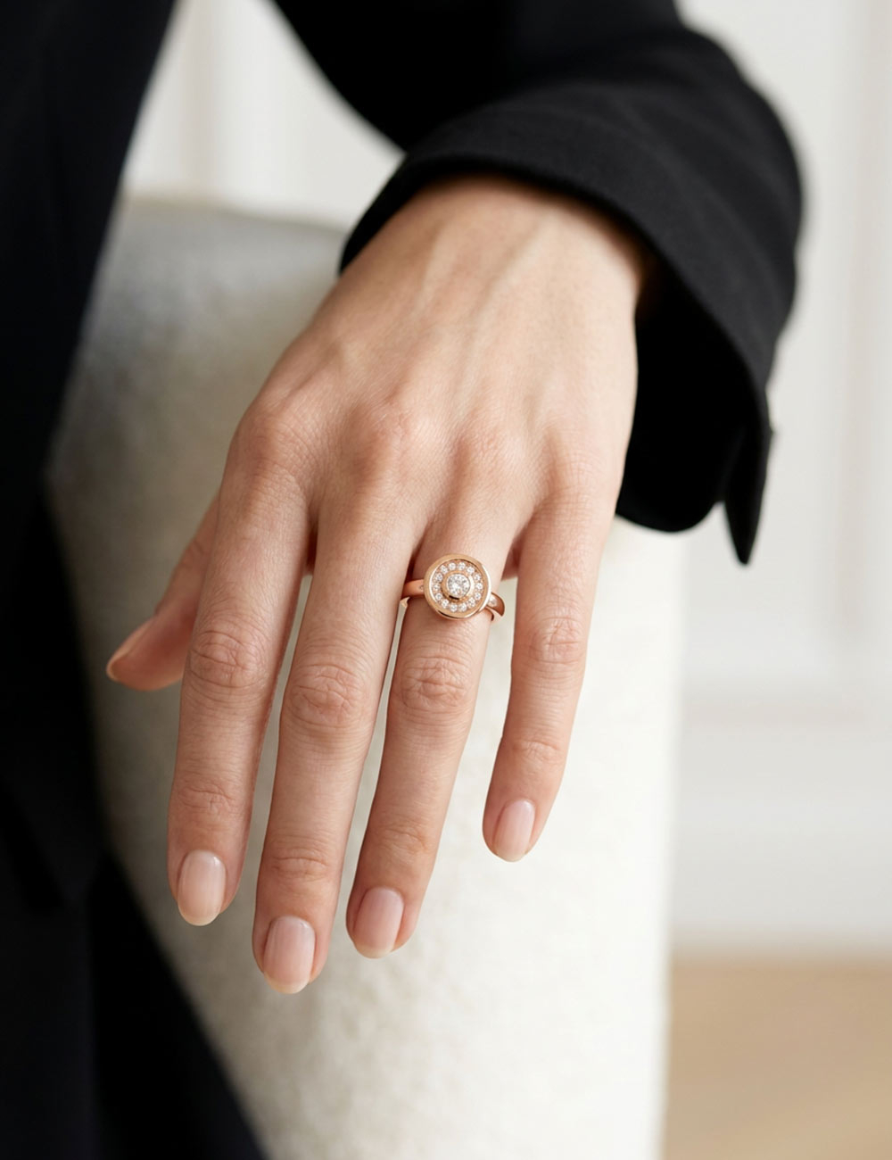 Allure 18k rose gold and white diamond ring worn on the finger, contemporary design by D.Bachet.