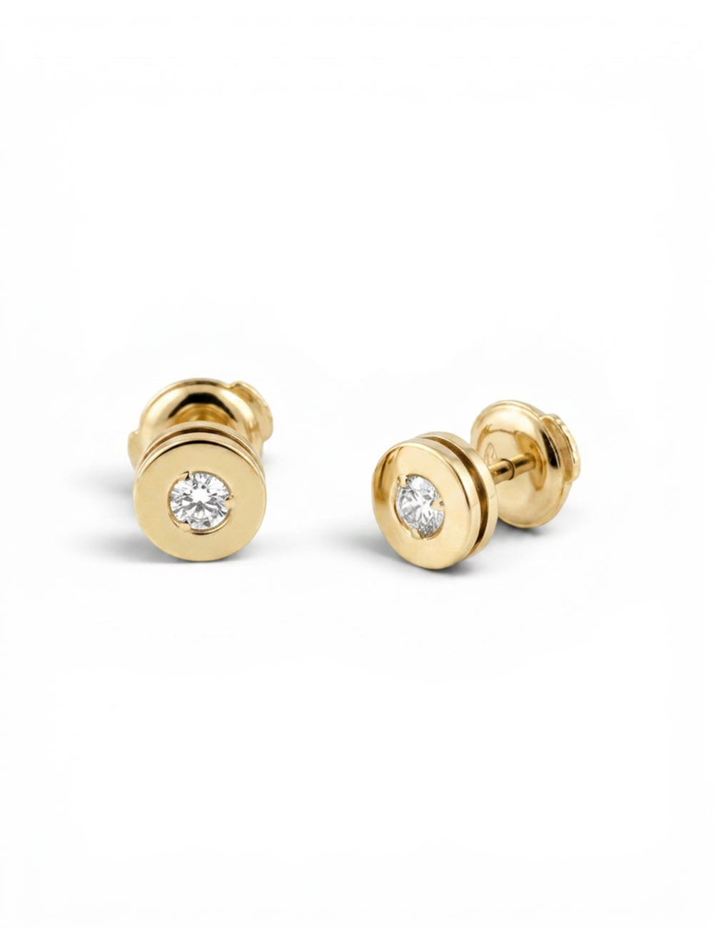Paire de boucles d'oreilles cylindriques ajourées en or jaune 18k, diamant central 0,10ct.