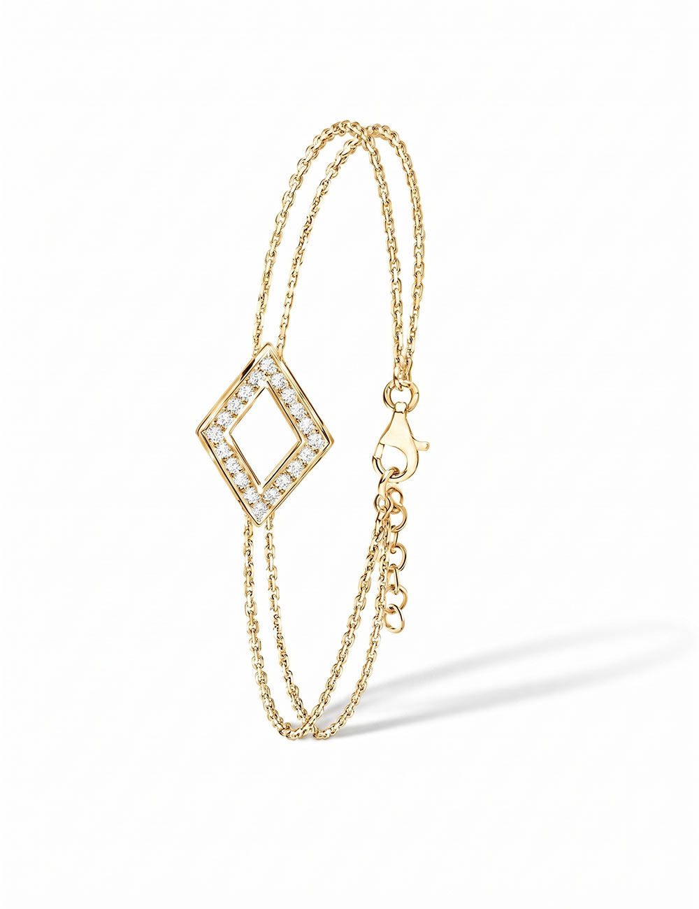Women's 18K yellow gold bracelet with double chain and diamond-shaped motif set with natural white diamonds.