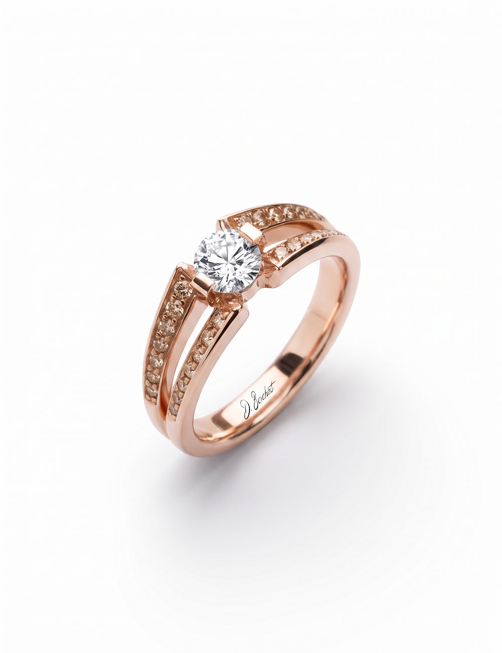 Sweet engagement ring in 18k rose gold, set with a 0.50 carat white diamond and brown diamonds.