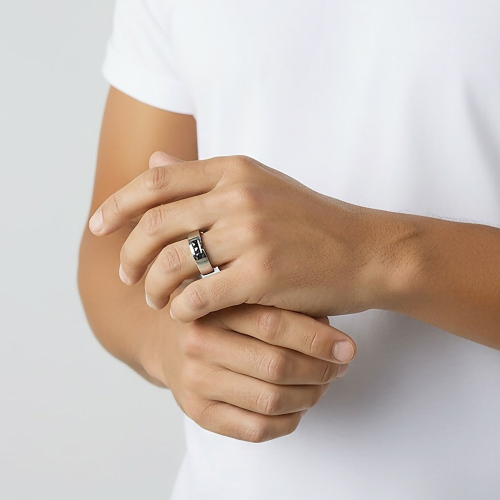 Bague de mariage en platine et trois diamants noirs
