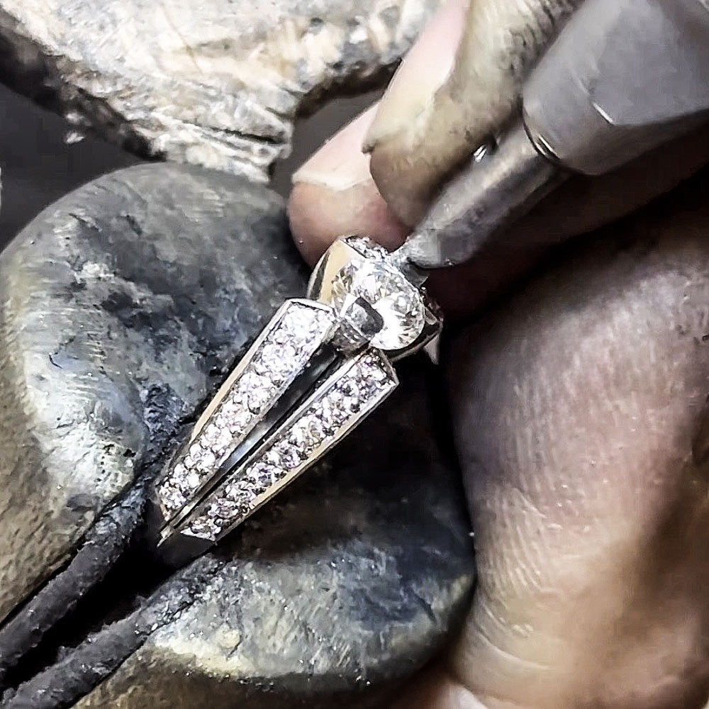 Platinum engagement ring with a double band and white diamonds
