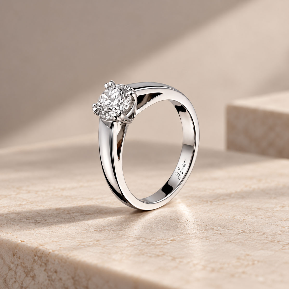 D.Bachet solitaire engagement ring with a central white diamond.