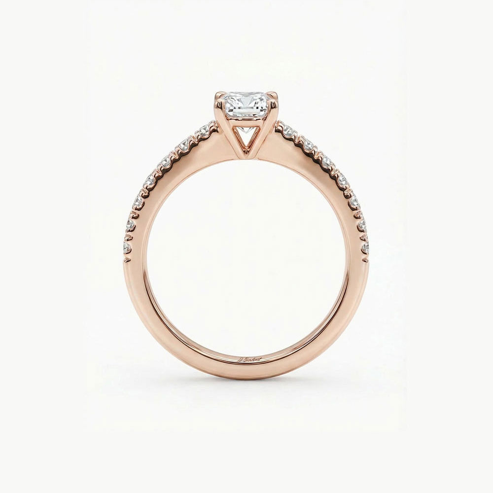 Bague de fiançailles Passion en or rose, solitaire accompagné avec diamant blanc naturel 0,50 carat et serti descendu D.Bachet.