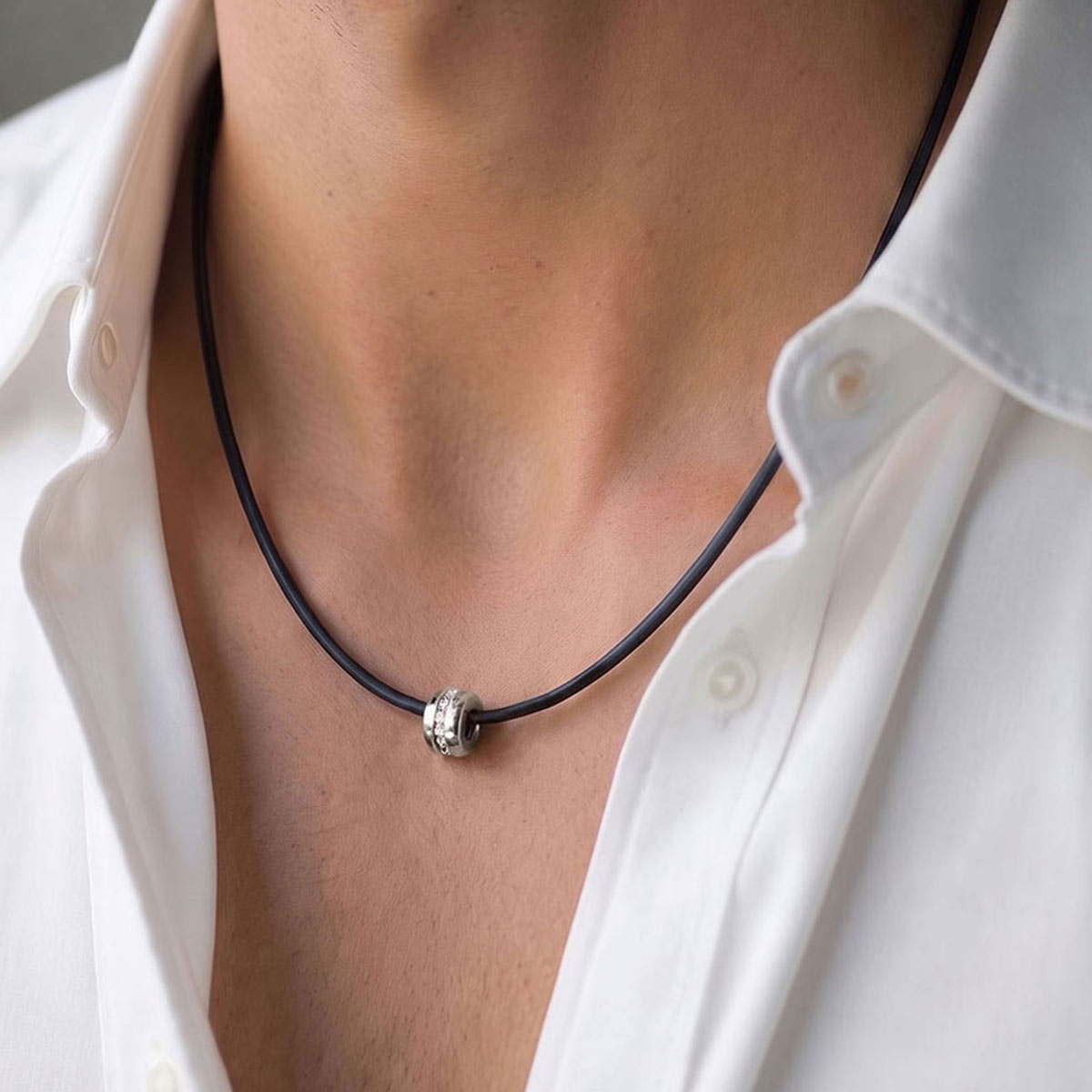A Way to Love men’s pendant with white diamonds on a black silicone cord